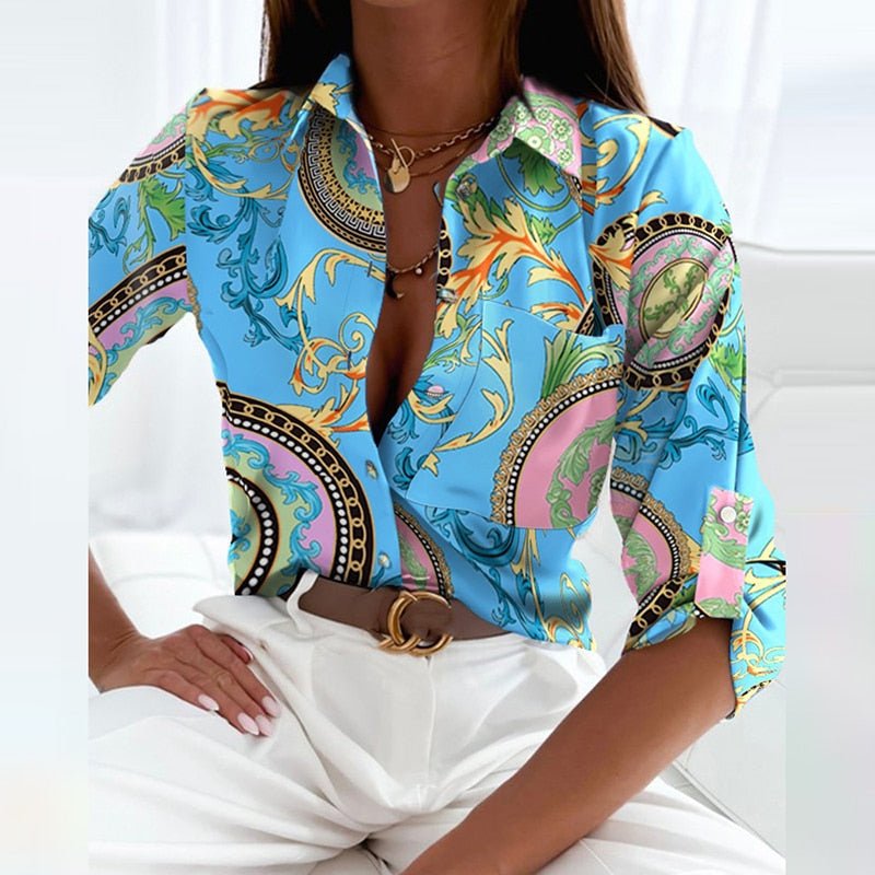 Women's collared long-sleeve blouse in crisp white, a timeless and versatile piece for work or casual.