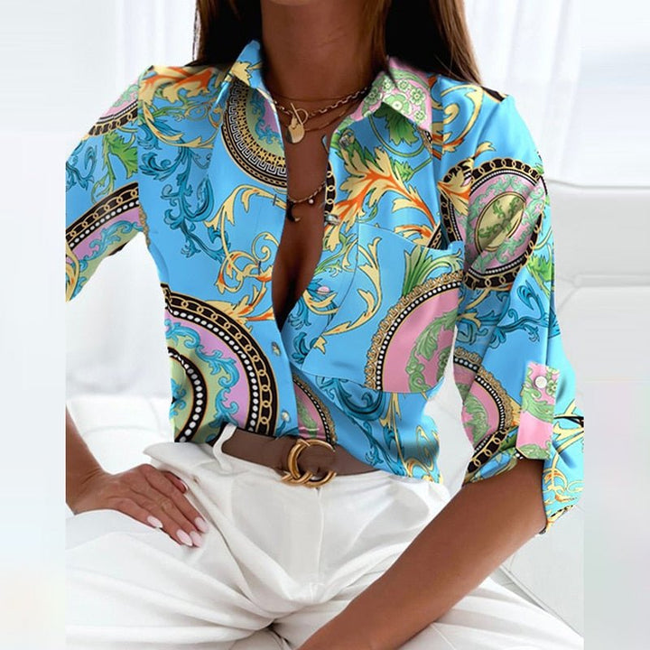 Women's collared long-sleeve blouse in crisp white, a timeless and versatile piece for work or casual.