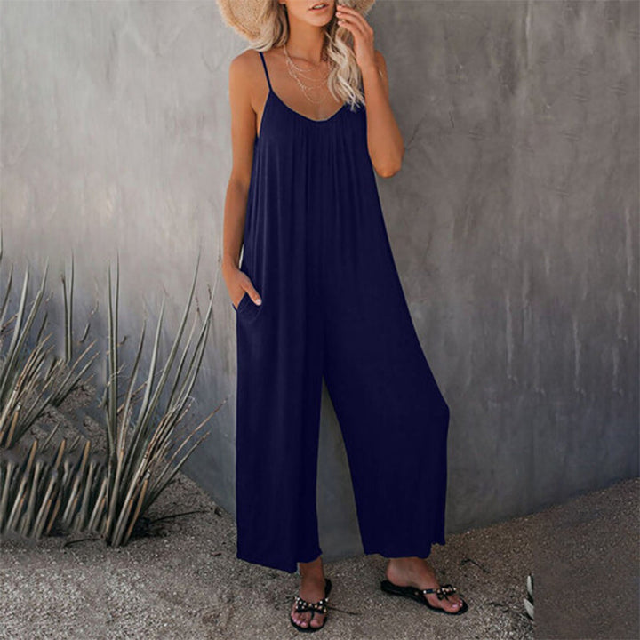 Flat lay of a polyester stretchy sleeveless jumpsuit, showcasing its simple yet chic design