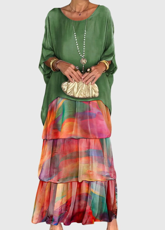 Women's abstract print tiered maxi dress, flowy boho style for summer vacation.