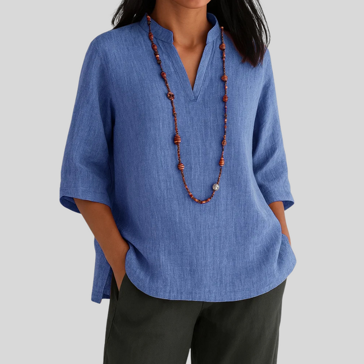 Comfortable ladies' summer top, a lightweight, airy blouse with a stylish relaxed fit for casual elegance.