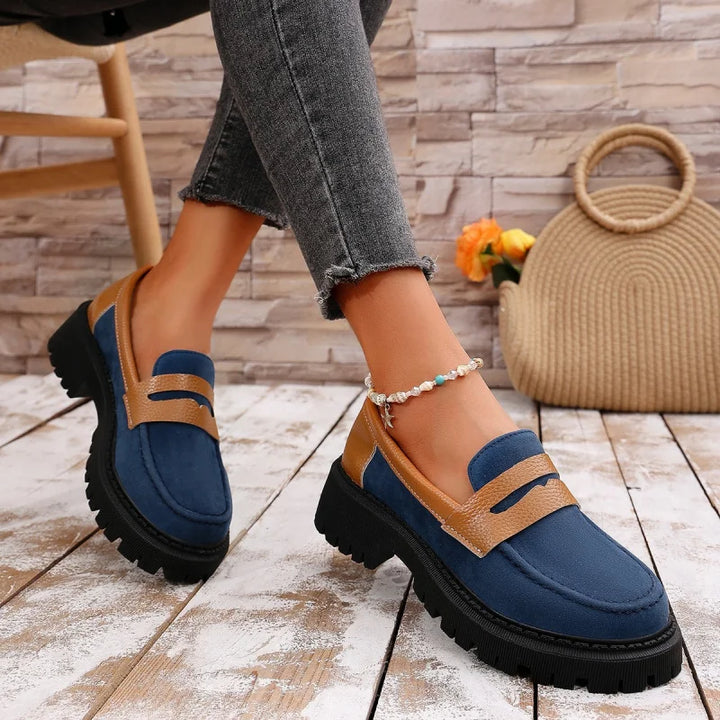 Close-up of the orthopedic insole in women's black comfort platform loafers