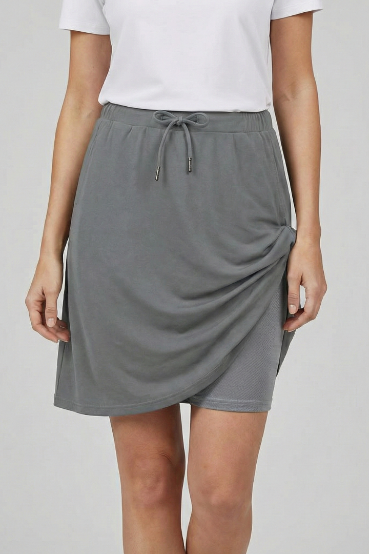 Comfortable women's everyday skirt. Drawstring waist skort with built-in shorts for ultimate versatility.