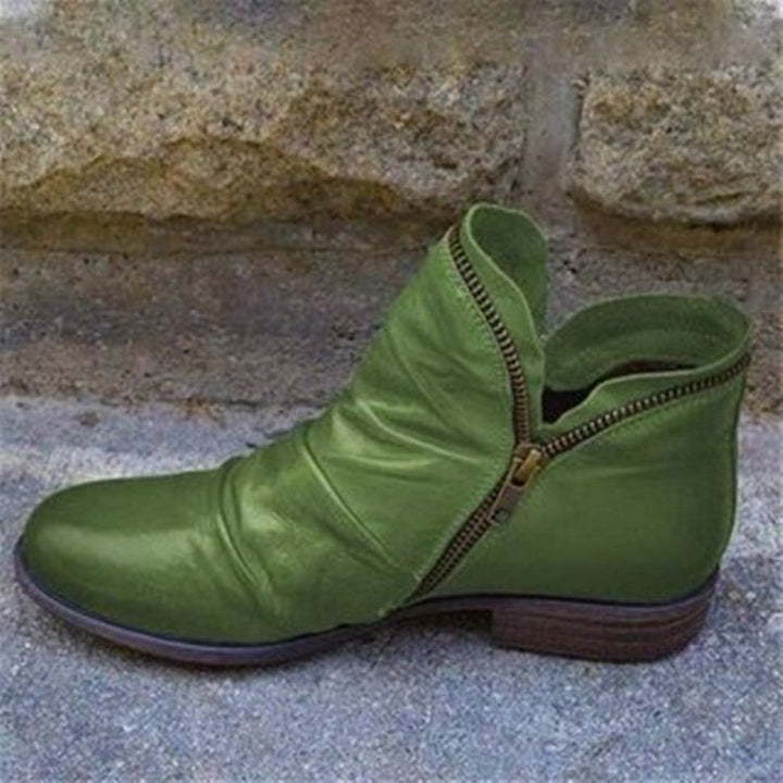 Women's ankle boots in premium leather, a comfortable and versatile choice for fall fashion.