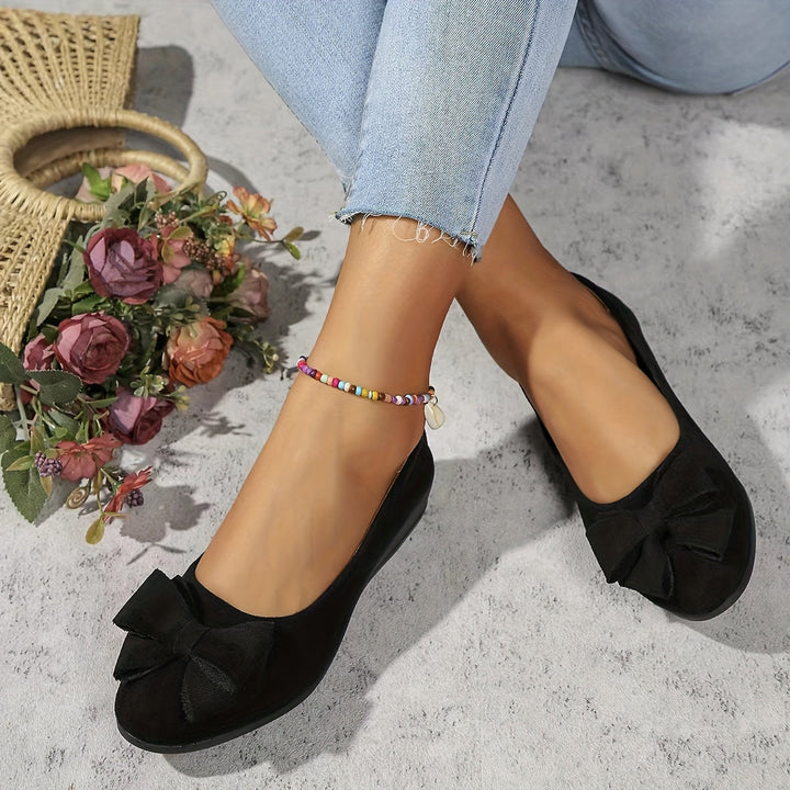 Stylish gray orthopedic flats for women, versatile daily wear comfort.