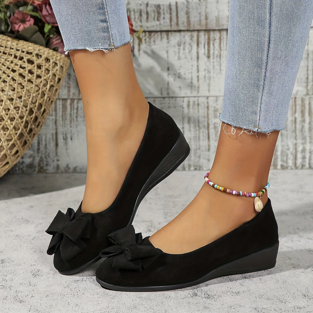 Elegant blue women's orthopedic flats, low heel, arch support.