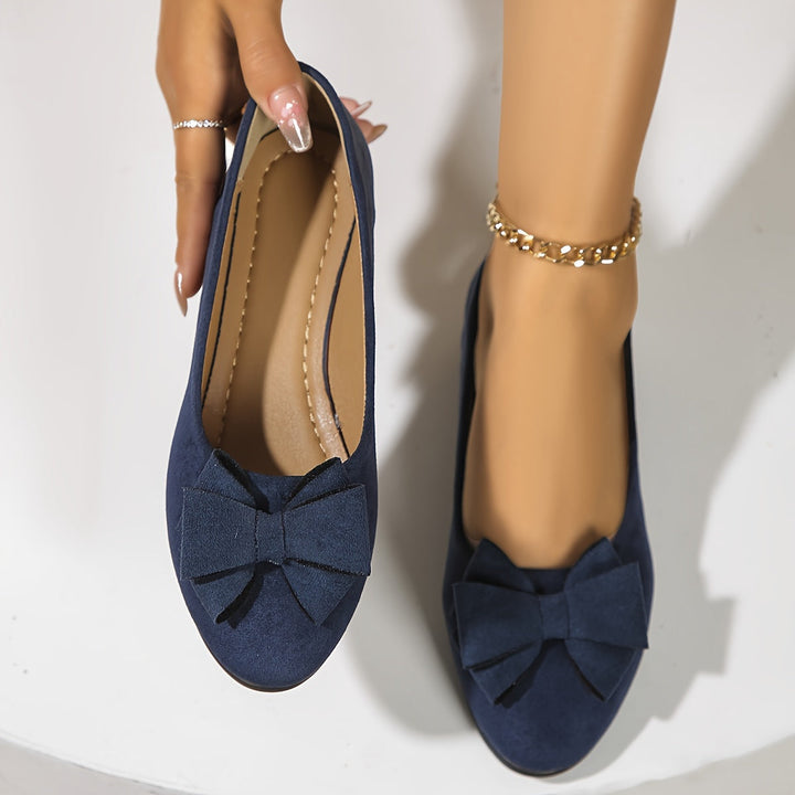 Blue orthopedic low heel flats for women, elegant and comfortable.