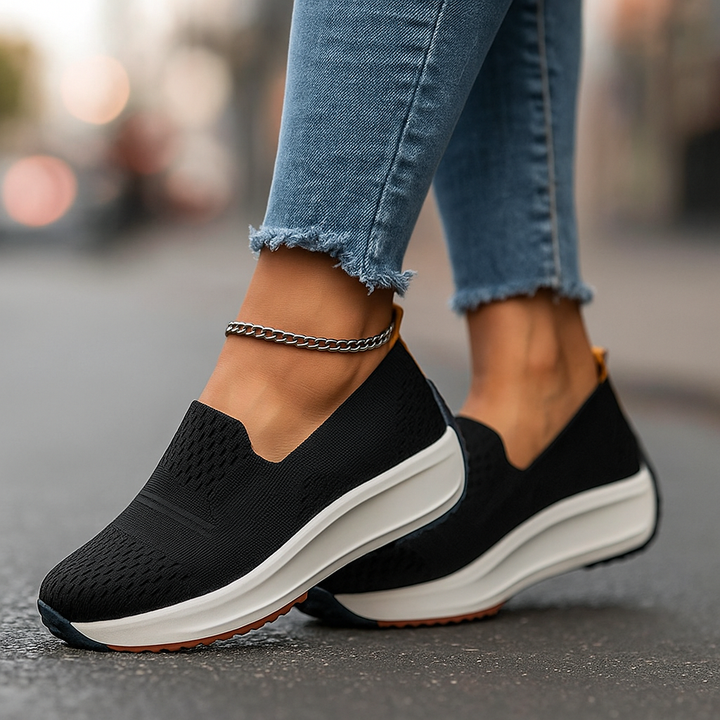 Side view of women's grey orthopedic slip-on walking shoes, breathable knit & cushioned sole