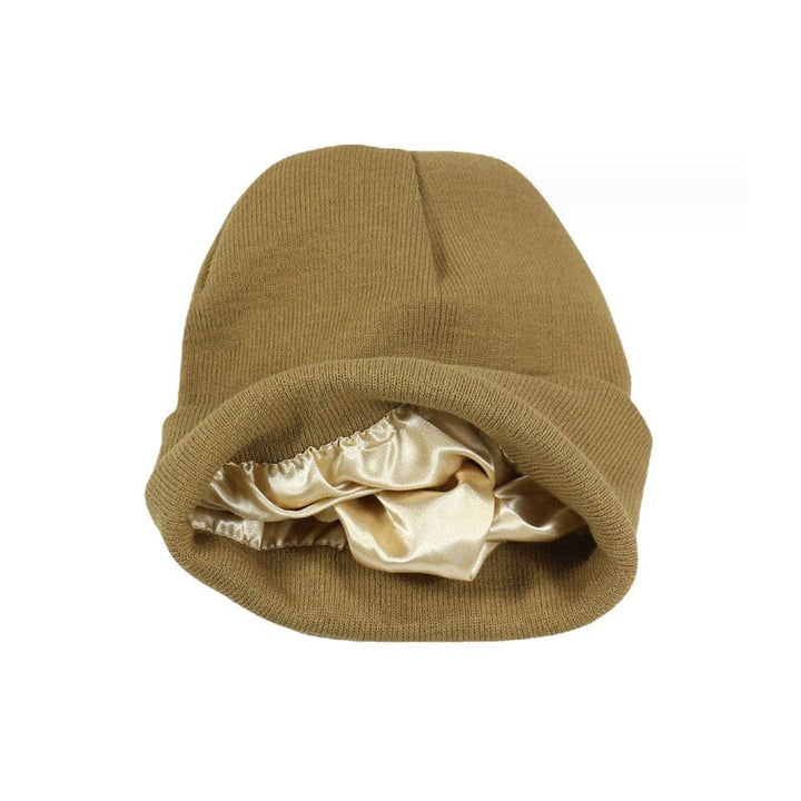 Women's black beanie with a visible satin lining, emphasizing hair protection
