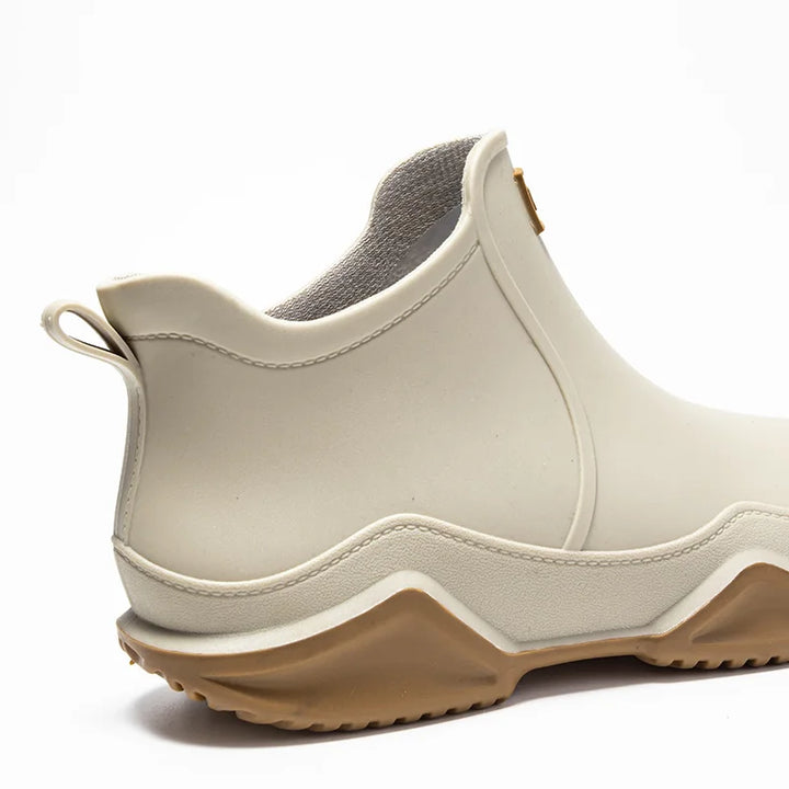 Versatile women's slip-on ankle boots, waterproof & durable, perfect for all your rainy day adventures.