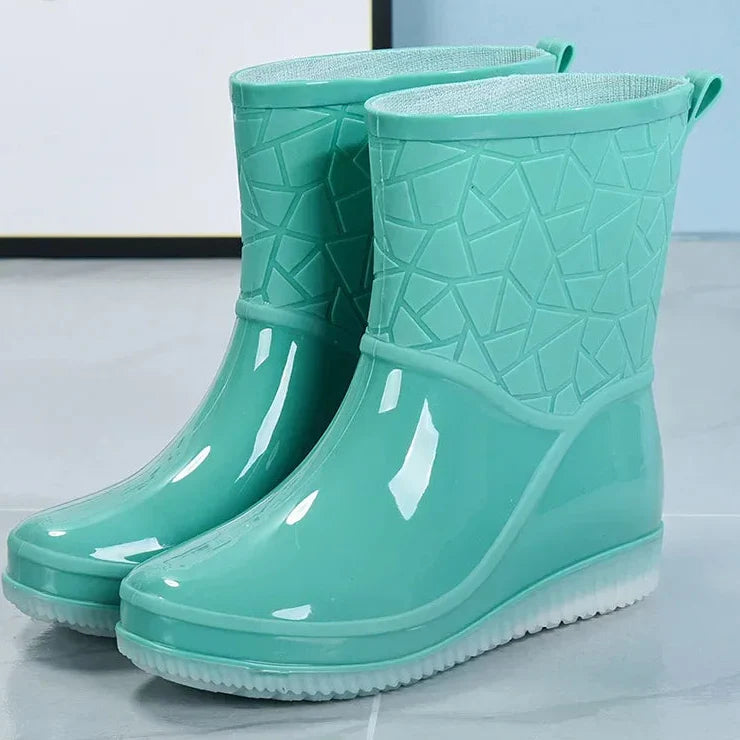 Pair of women's durable waterproof winter boots, slip-resistant for wet conditions
