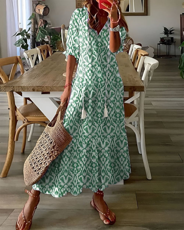 Women's boho midi dress with adjustable straps, ideal for vacation and summer style.