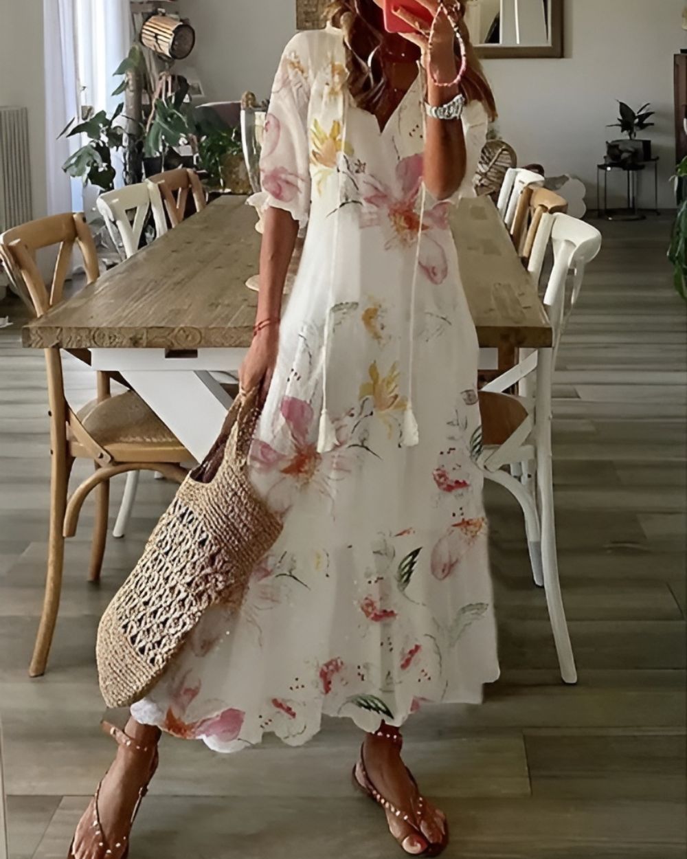 Women's printed boho maxi dress with vibrant floral patterns. Long, elegant, suitable for summer fashion.