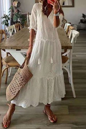 Stylish women's long floral print maxi dress with tassels, a bohemian v-neck perfect for spring & summer.