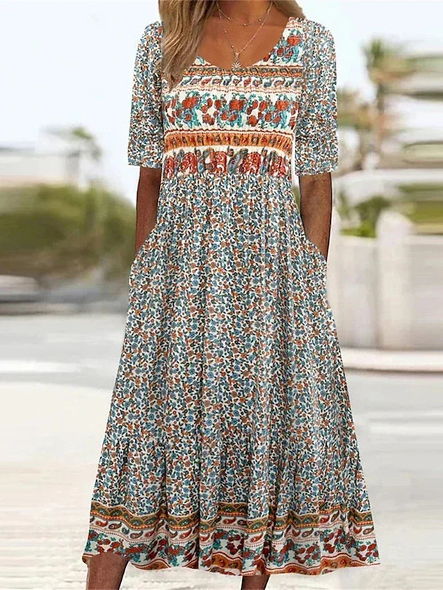 Women's boho print midi dress with flattering gathered waist, functional pockets, and short sleeves for summer casual wear.