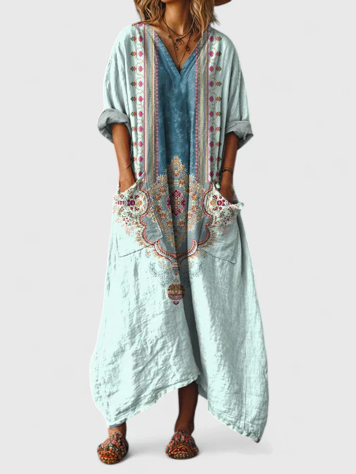 Women's comfortable maxi dress, featuring a stylish boho print, V-neck, 3/4 sleeves, and a prominent front pocket.