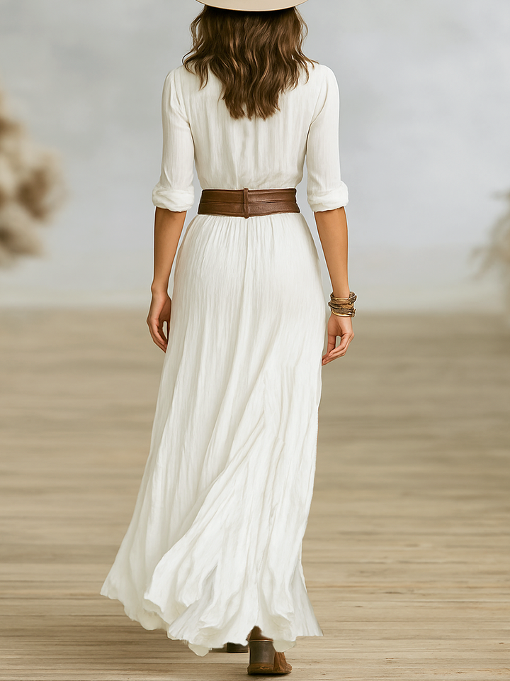 Comfortable & chic women's boho western maxi dress. Features a high slit, V-neck, & long sleeves for summer.