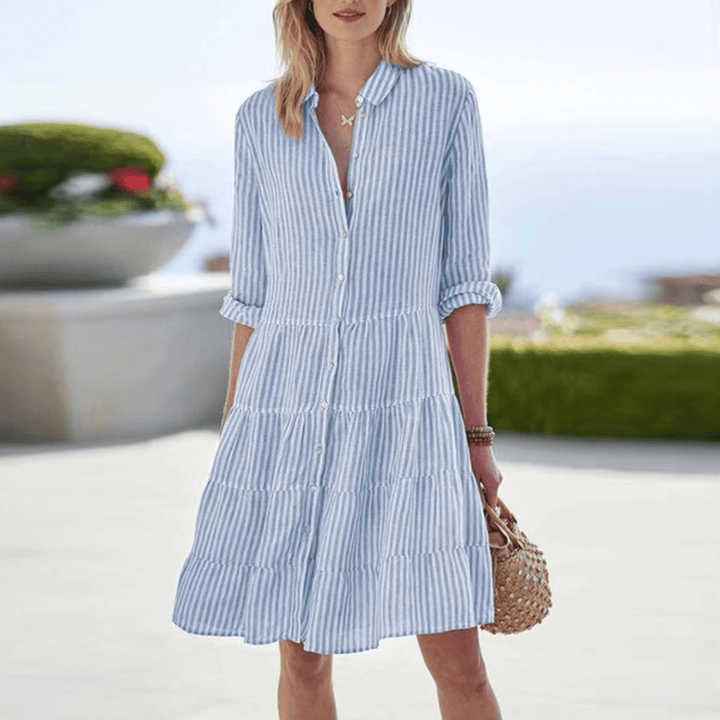 Versatile women's striped A-line midi dress, offering breezy and flowy comfort for any summer occasion.