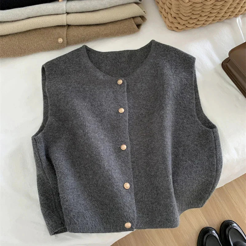Women's button-up sleeveless casual vest in a light fabric, perfect for layering and comfortable wear.