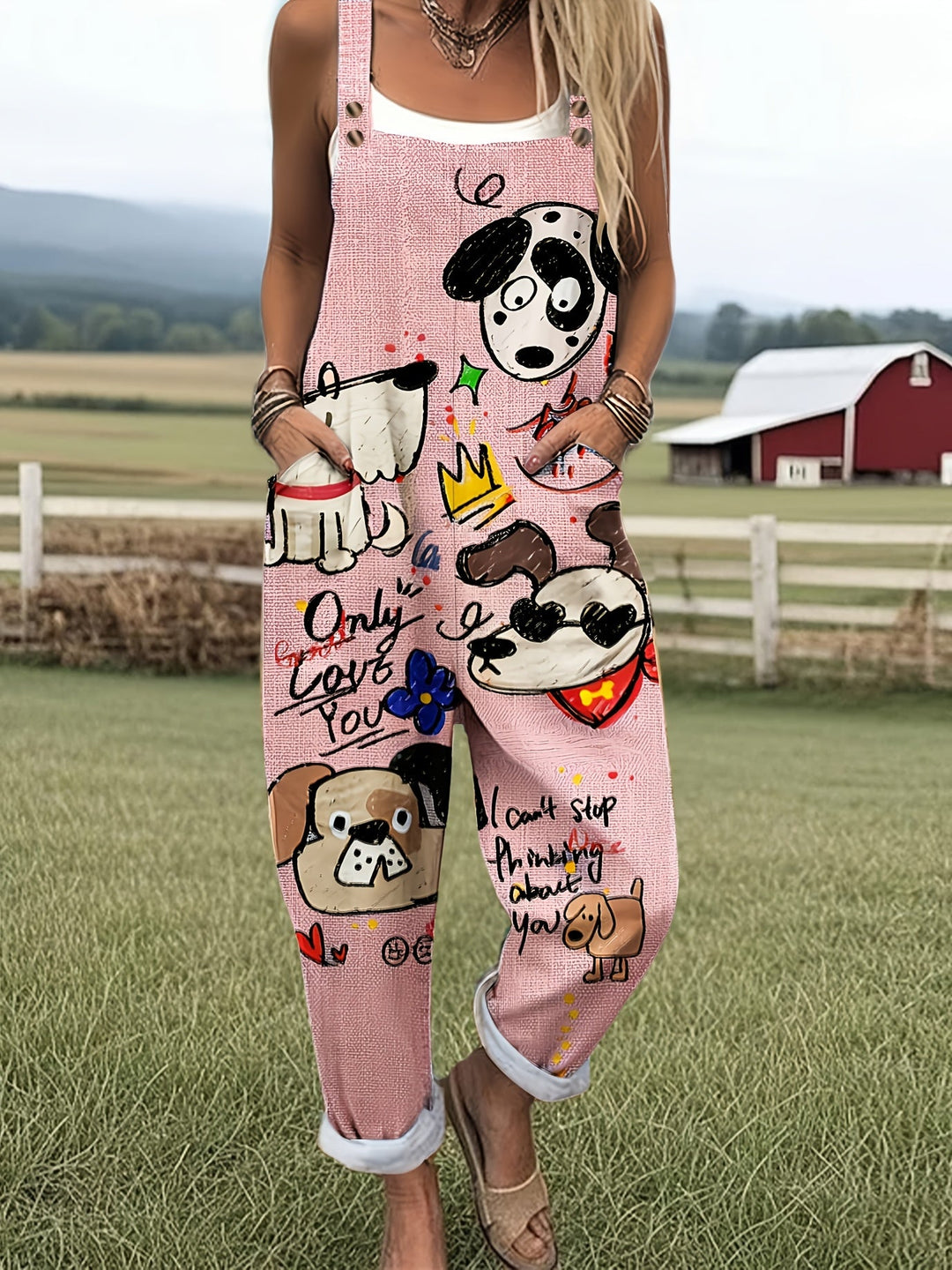 Relaxed fit women's jumpsuit with adjustable straps and fun dog print design.