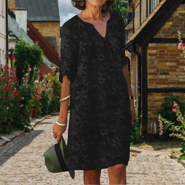 Comfortable women's floral midi dress, a stylish casual choice for warm weather.