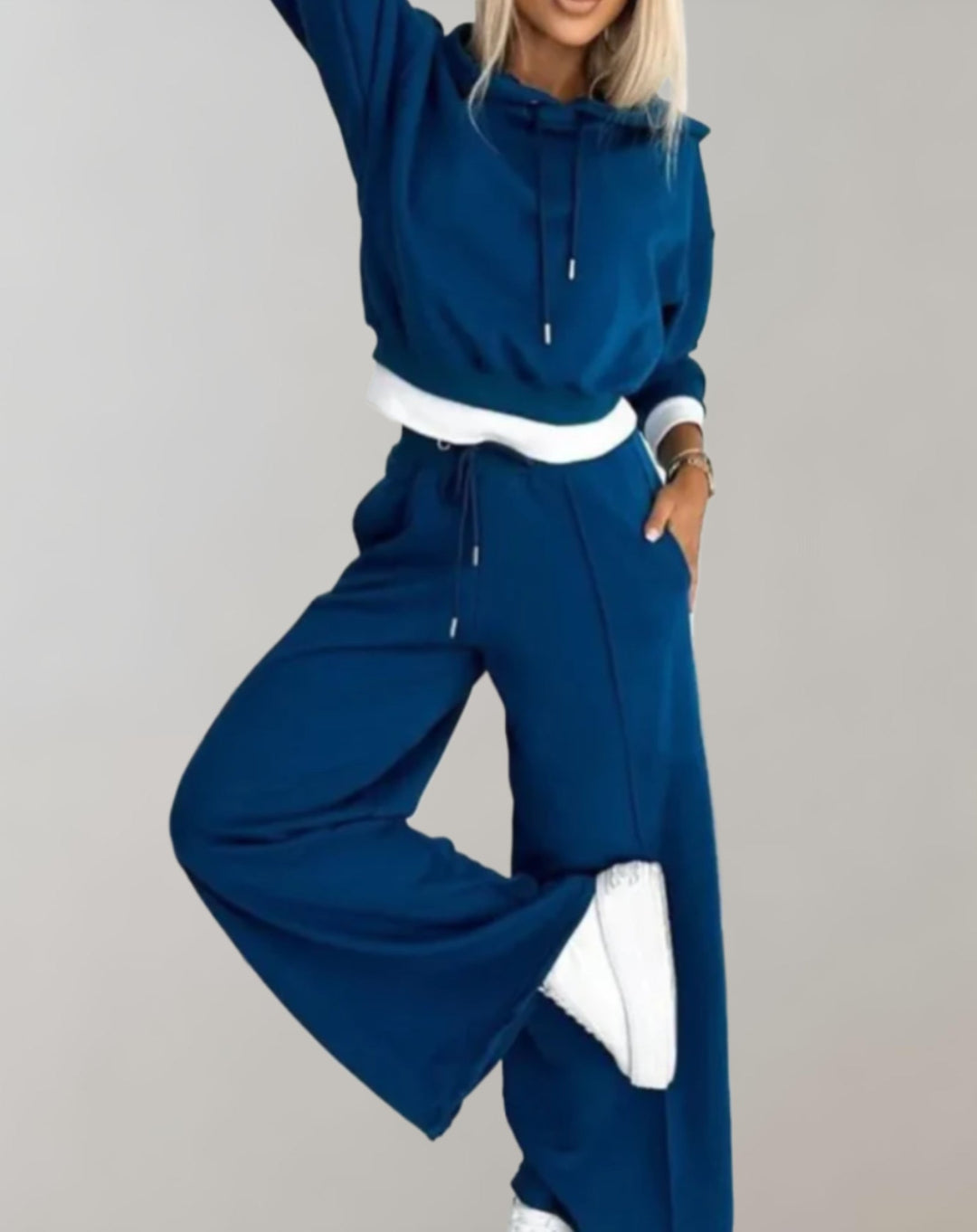 Zoomed in detail of the soft fabric on a women's comfortable grey tracksuit set