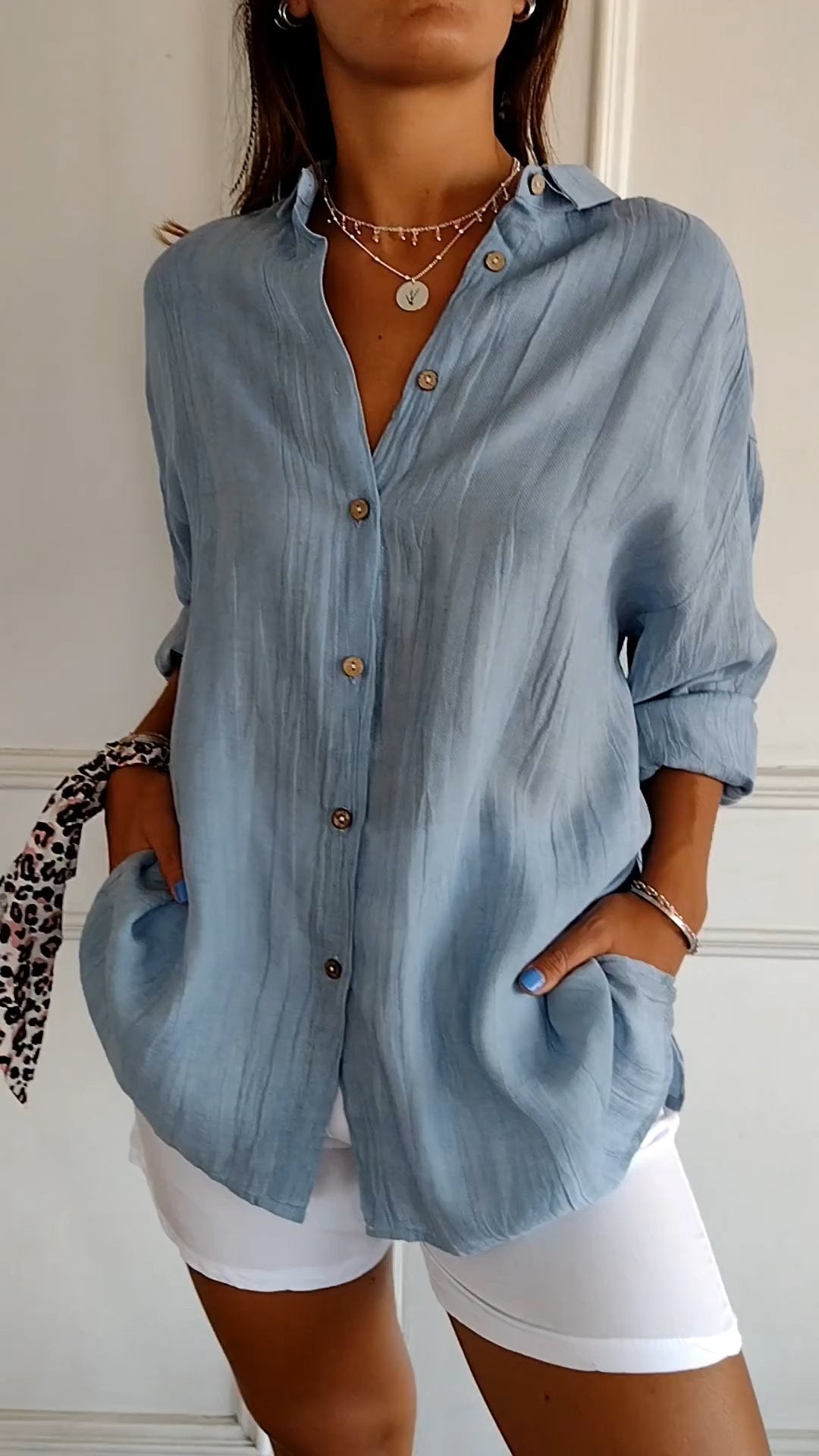 Women's casual long sleeve button-down shirt in a relaxed fit, perfect for everyday wear.