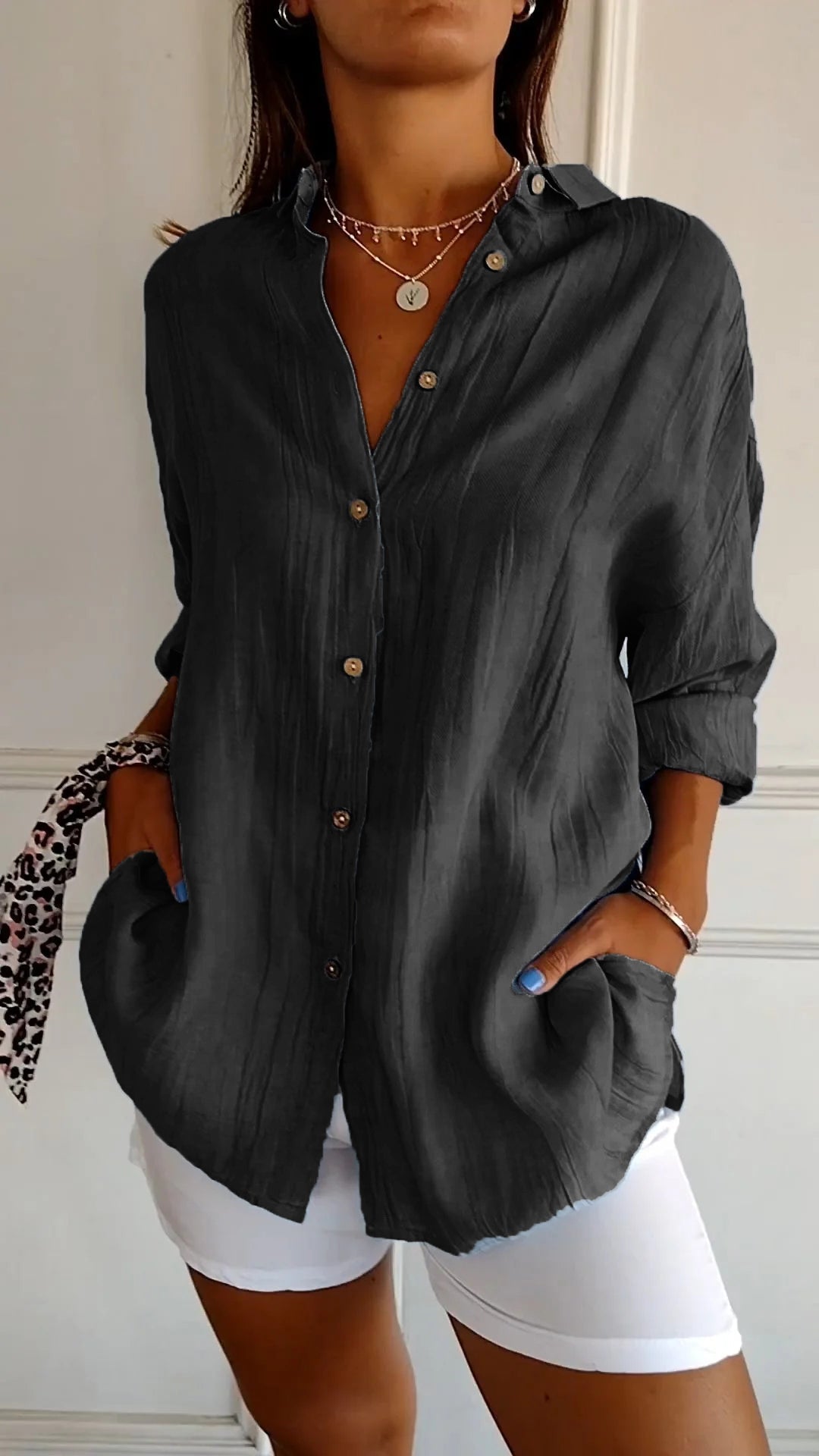 Chic women's oversized long sleeve button-down, a comfortable and fashionable top for any occasion.