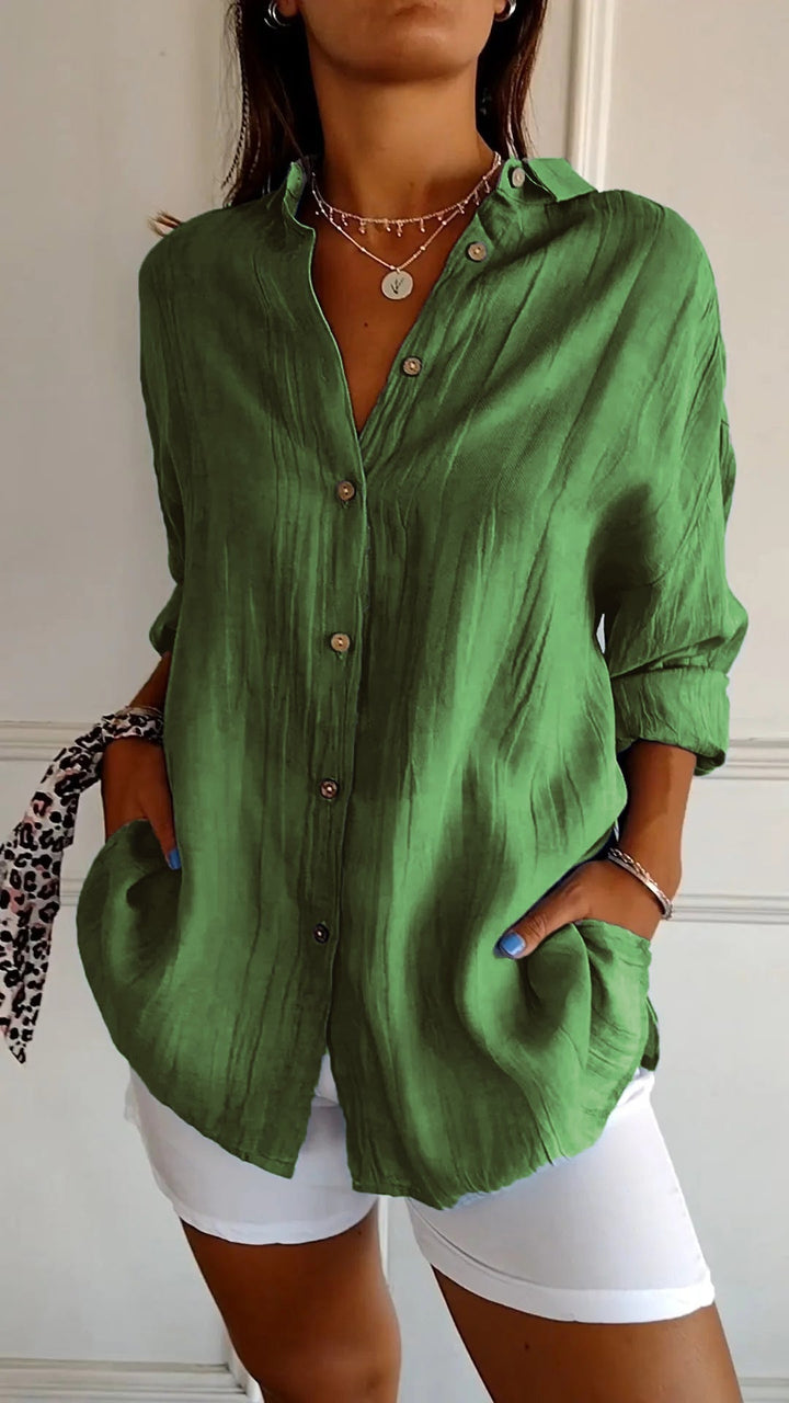 Women's button-down long sleeve shirt, an essential piece for versatile spring and summer styling.