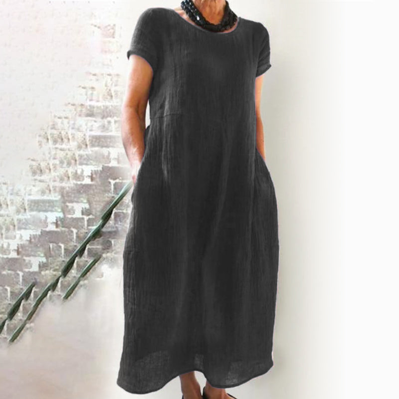 Women's casual solid color cotton dress, loose fit, a versatile piece for any wardrobe.