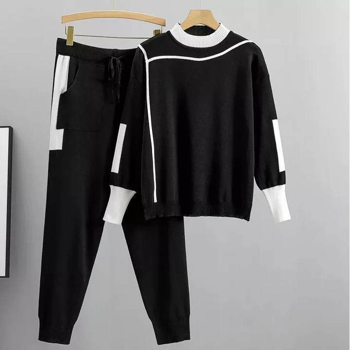 Relaxed fit women's lounge set with a stylish sweater and jogger pants, great for everyday wear.