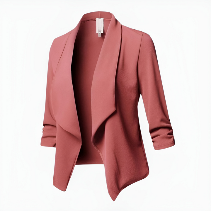 Full body shot of a woman wearing a casual open front office blazer, demonstrating fit.