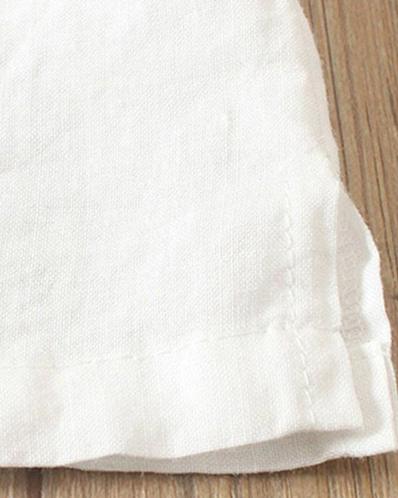 Relaxed women's short sleeve button-front shirt with crew neck & curved hem, ideal for casual spring summer style.