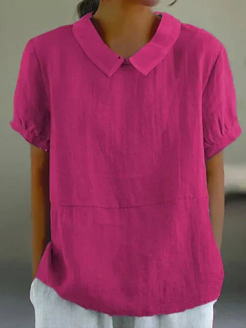 Women's short-sleeve casual top with distinctive Peter Pan collar. Relaxed fit, perfect versatile blouse for spring/summer.
