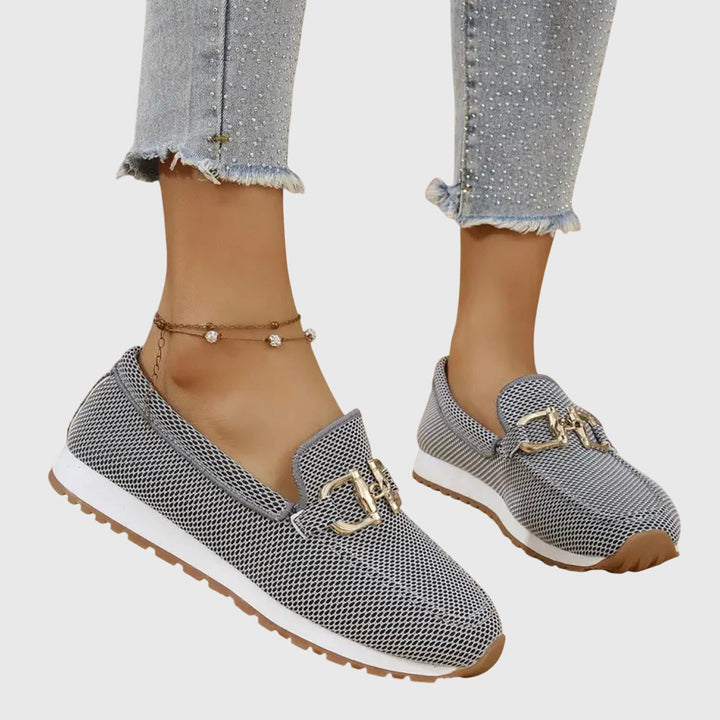 Stylish women's slip-on loafers with a flexible sole, great for spring and summer outfits.