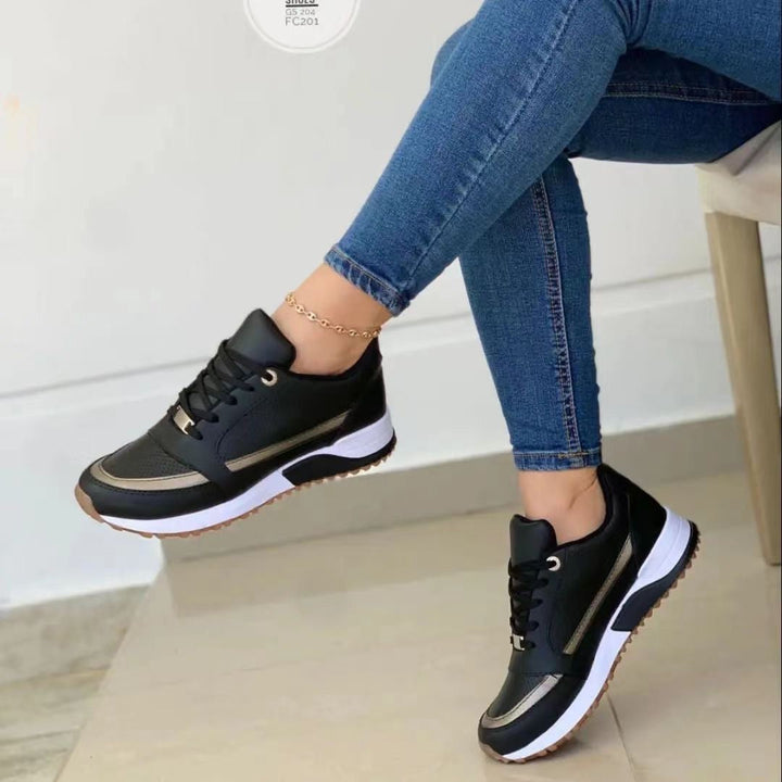 Fashionable women's gold trim lace-up platform sneakers, ideal for chic everyday style & versatile comfort.