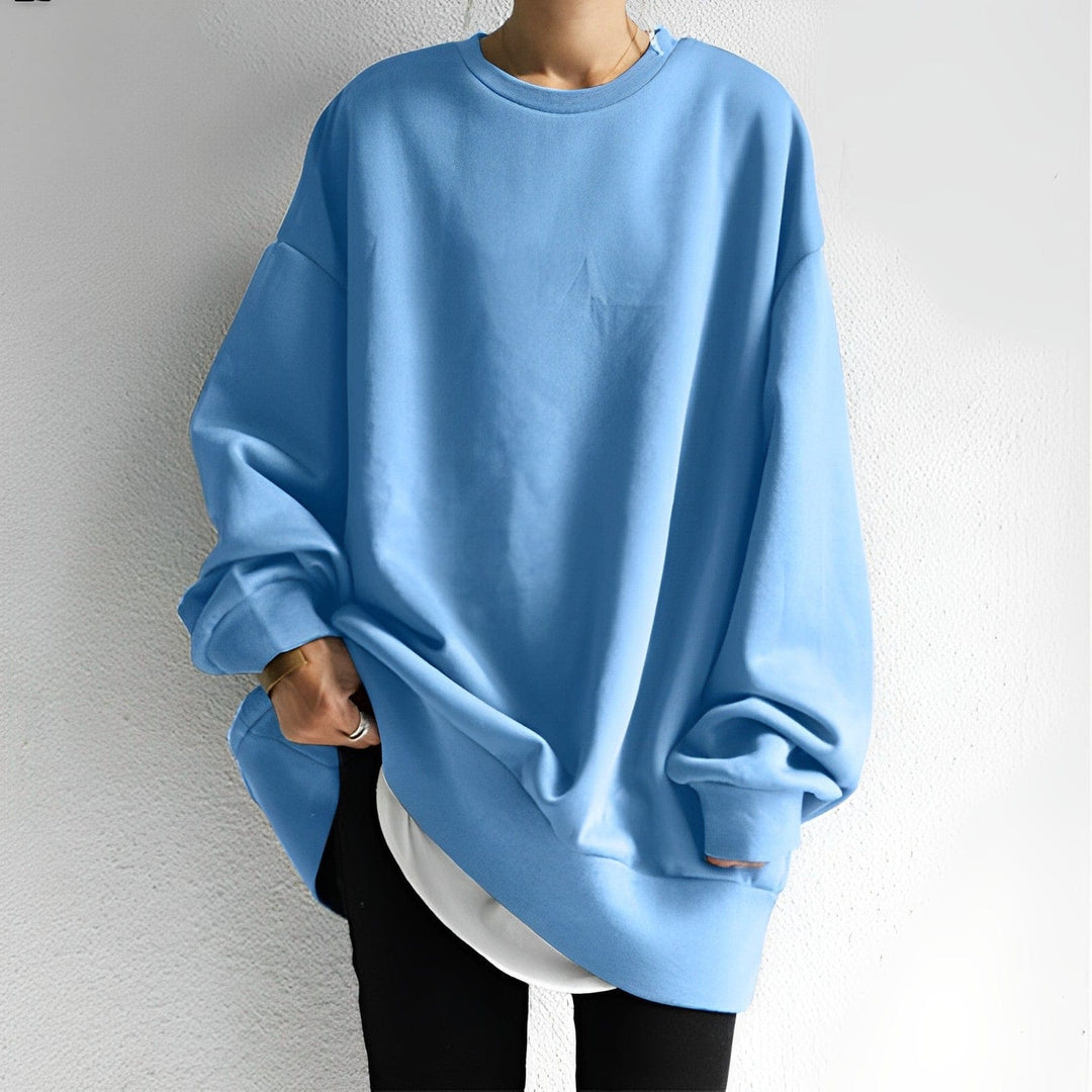 Textured oversized women's sweater. Comfortable long-sleeve knit pullover, ideal for everyday cozy fall fashion.