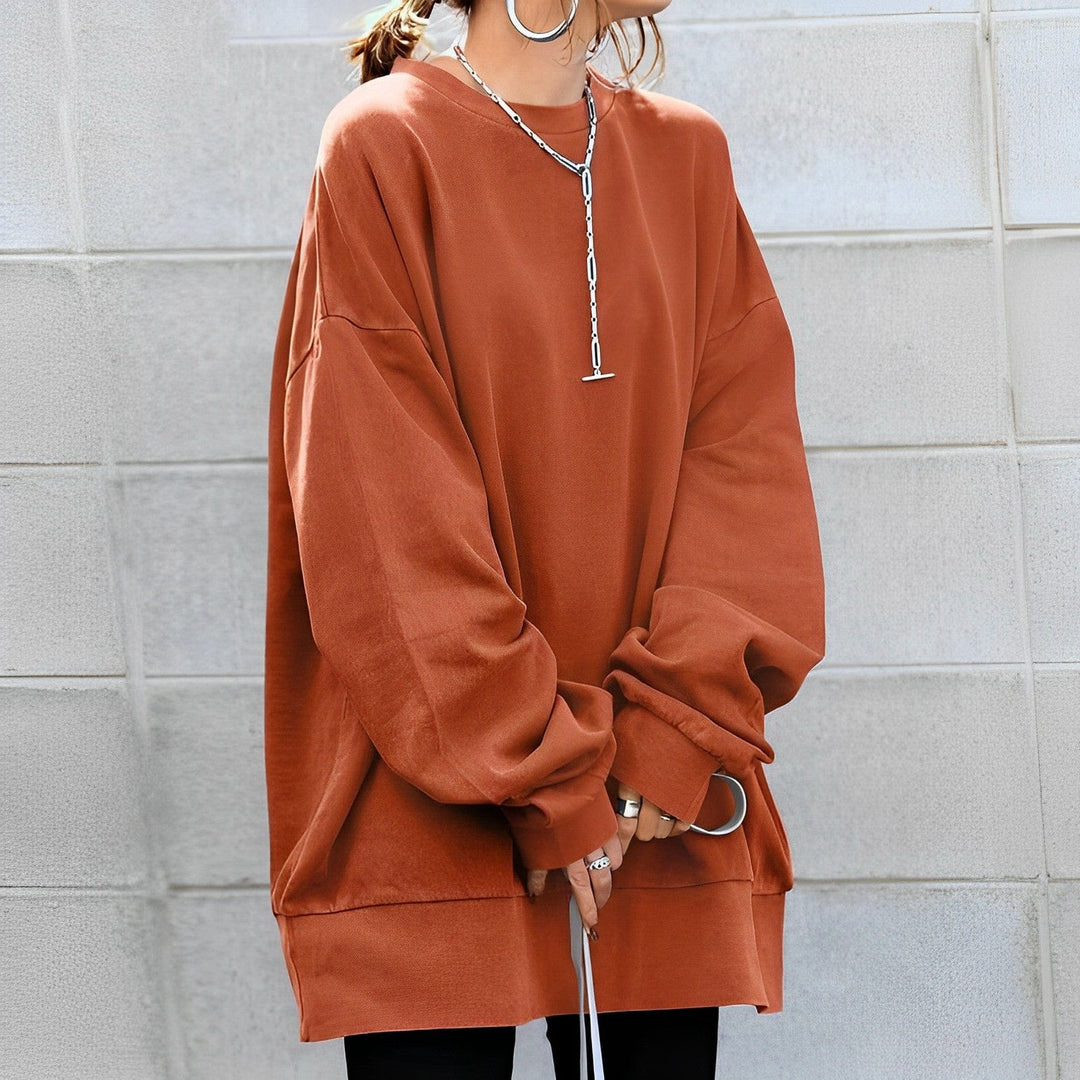 Stylish women's oversized pullover sweater. Warm knit long-sleeve, excellent for comfortable casual winter fashion.