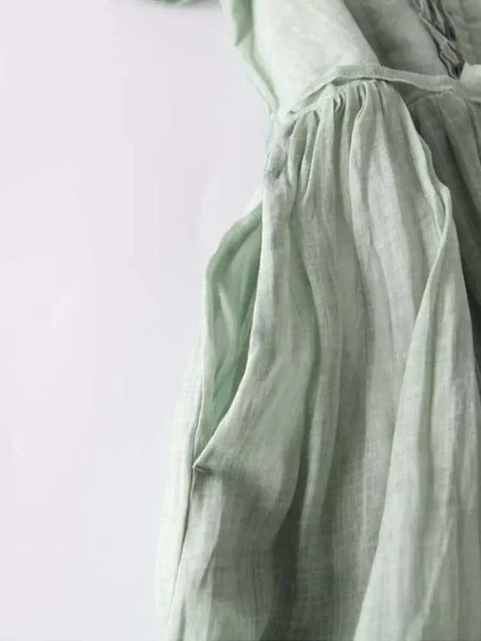Elegant women's summer sundress, perfect beachwear or casual vacation dress. Light & flowy fit.