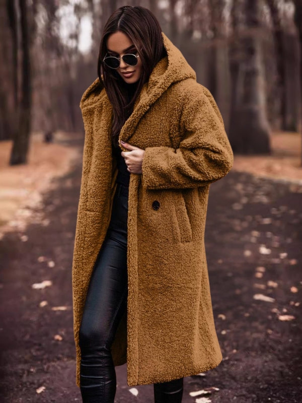 Classic women's fall trench coat, double-breasted with a stylish belt. Elegant outerwear for versatile style.