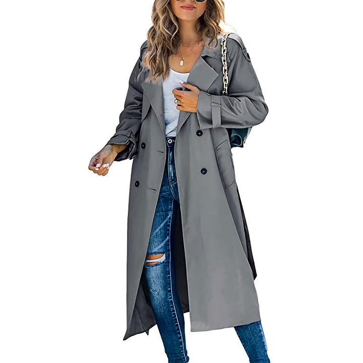 Stylish women's long trench coat for effortless spring and autumn layering; classic outerwear.