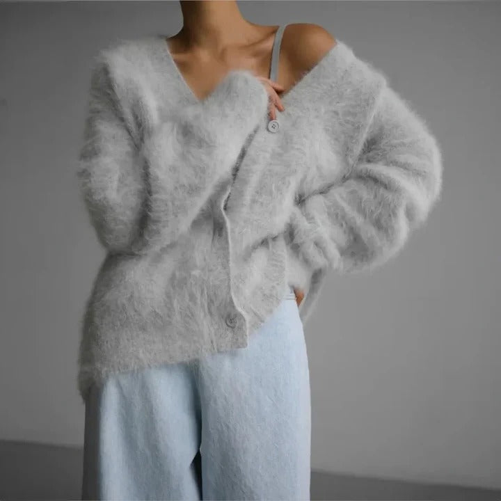 Soft feel women's knitwear with a classic round neck. Elegant and versatile winter sweater in cozy comfort style.