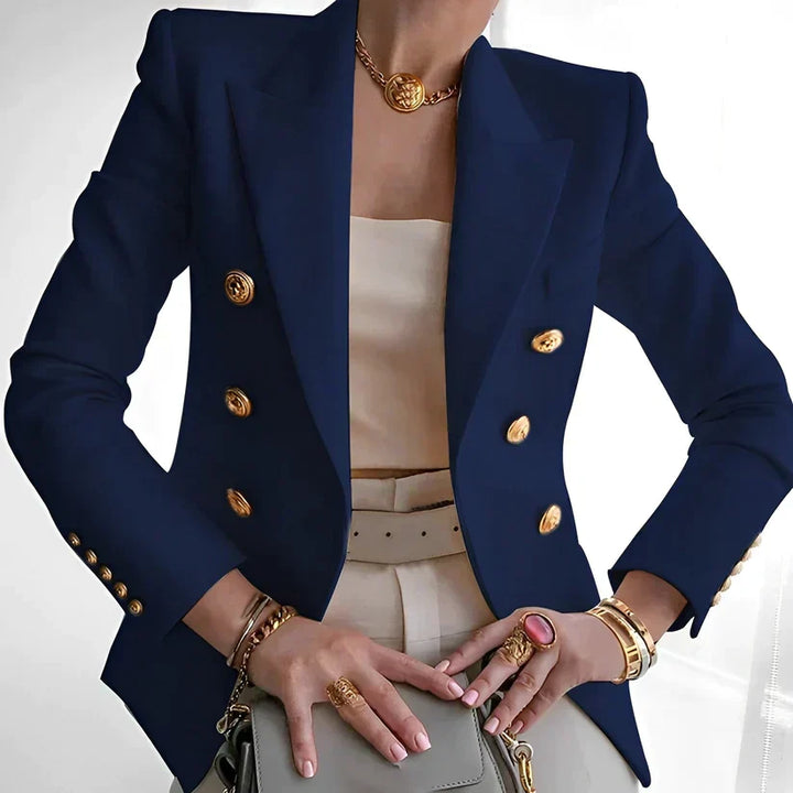 Model wearing a women's vintage style tailored blazer, ideal for smart casual or professional office fashion.