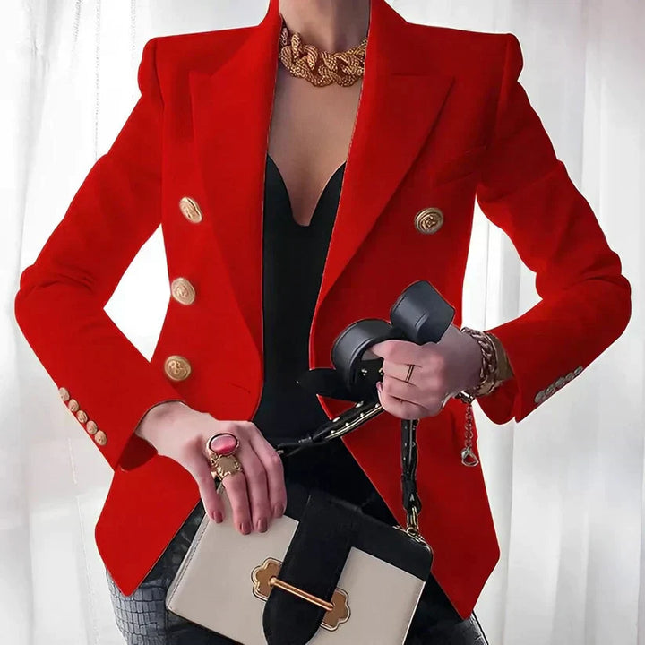 Side profile of women's tailored blazer, combining vintage style with a modern edge for a sophisticated silhouette.
