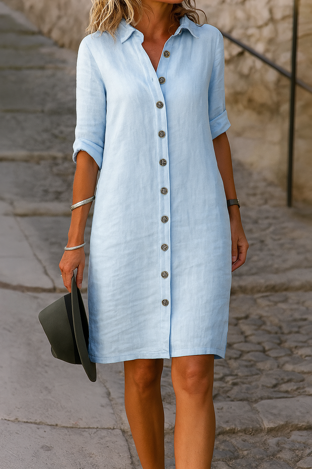 Women's button-up collared dress, perfect for casual summer and spring outfits.