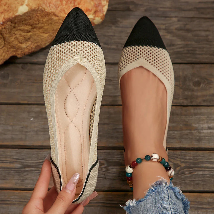 Women's comfortable black knit pointed toe flats, perfect for everyday wear and breathability.