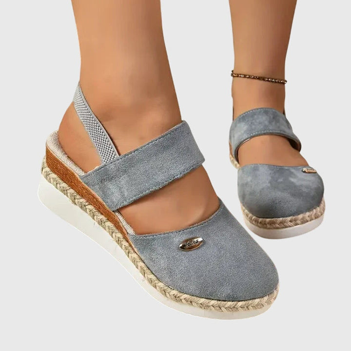 Boho chic women's sandals featuring elegant beading & a flexible elastic ankle strap for all-day comfort.
