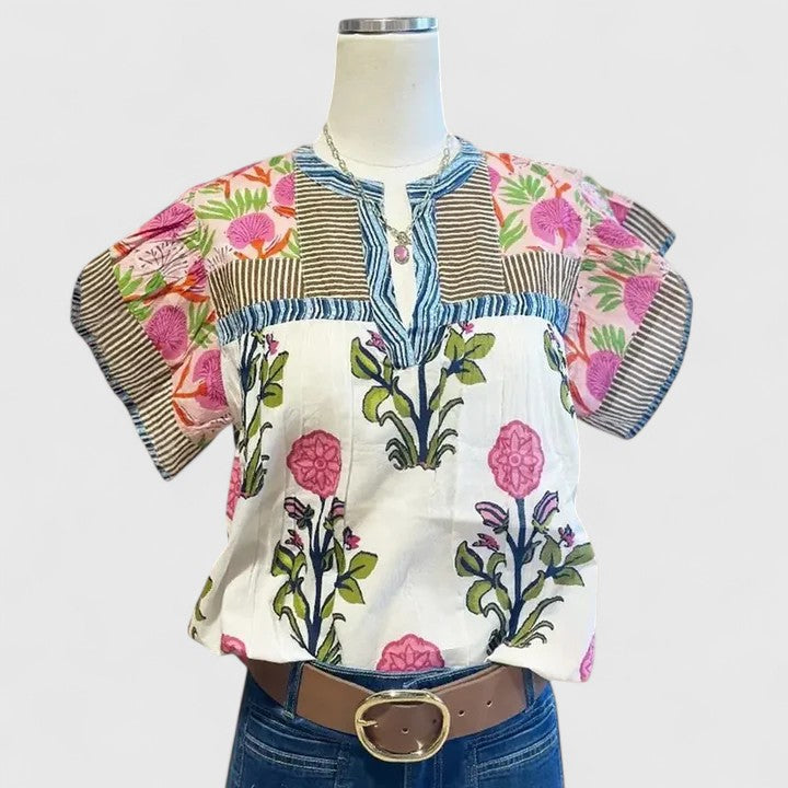 Women's comfortable embroidered blouse with boho floral details, perfect for spring casual wear or everyday elegance.
