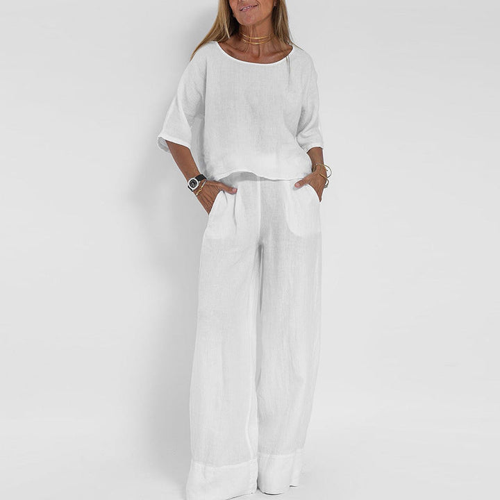 Full shot of a model wearing a women's comfortable loose fit two-piece set, showcasing flexibility