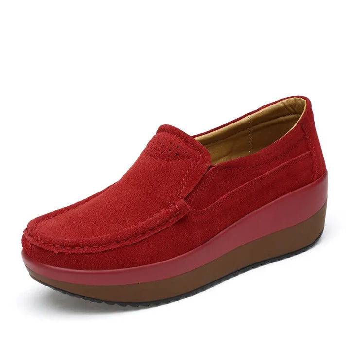Pair of women's comfortable khaki suede slip-on loafers, ideal for everyday casual style